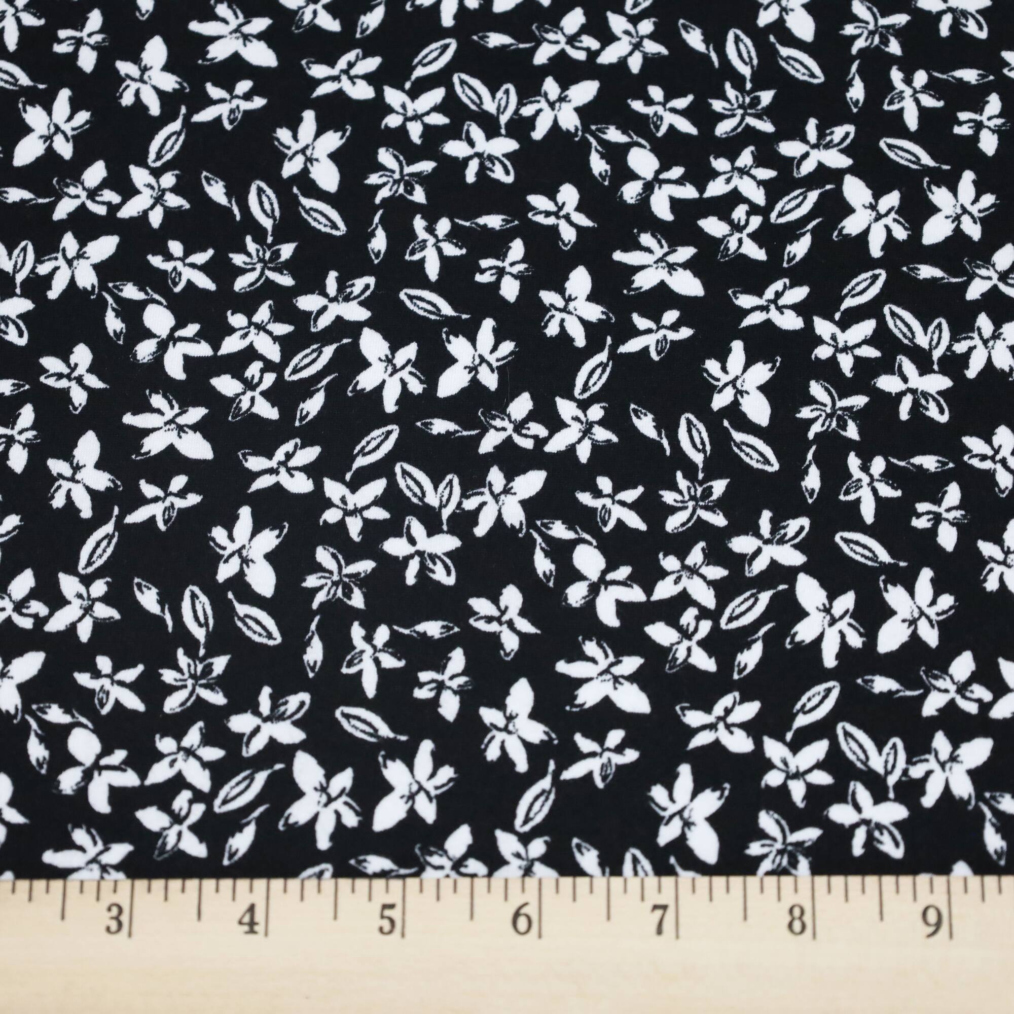 Fabric Merchants Leaves on Black Double Brushed Stretch Fabric